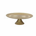 Round textured cake stand on a white background