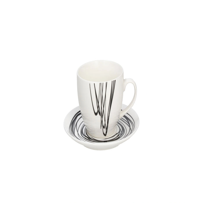 White mug with black abstract design on a matching saucer on a white background