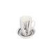 White mug with black abstract design on a matching saucer on a white background
