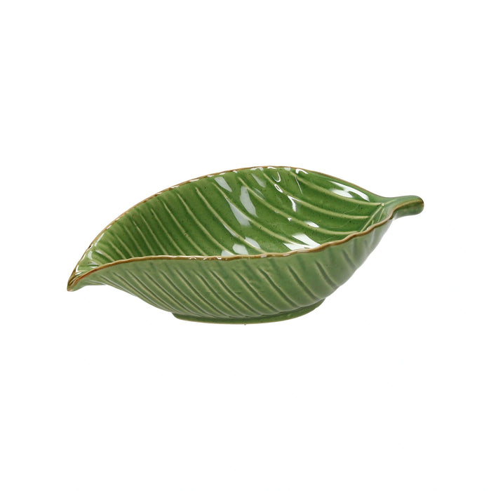 Green leaf-shaped ceramic dish on a white background