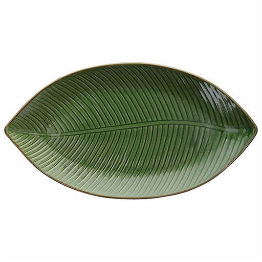 Green leaf-shaped ceramic plate on a white background