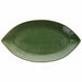 Green leaf-shaped ceramic plate on a white background