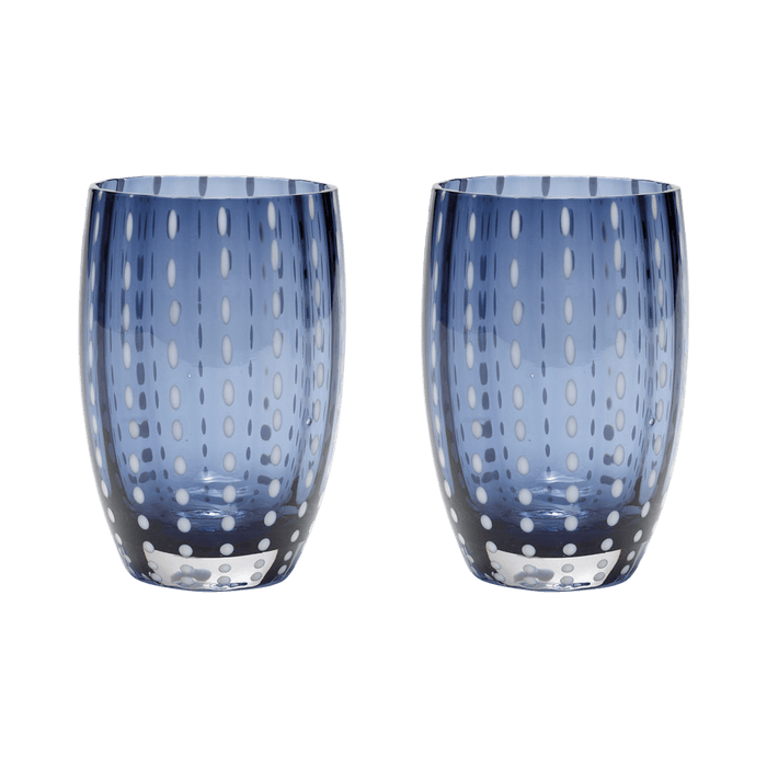 Two blue patterned glass tumblers on a transparent background