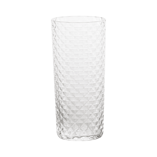 Clear glass vase with textured pattern on a green background