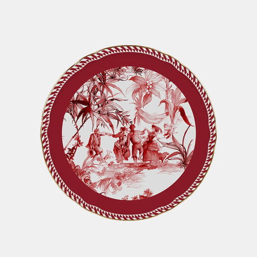 Decorative plate with red and white floral and figurine design on a light gray background
