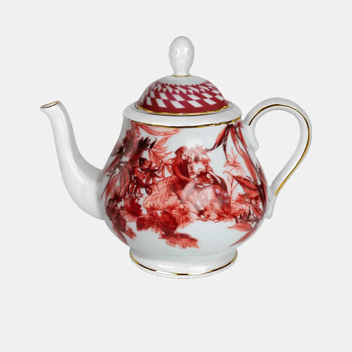 White teapot with red floral design on a white background