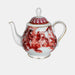 White teapot with red floral design on a white background