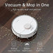 Robotic vacuum cleaner on a wooden floor with dust and pet hair, highlighting its cleaning capabilities.