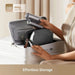 Person organizing travel items into a compact bag with a hair dryer inside, labeled '300g Lightweight'.