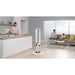 Modern kitchen and living room with a Dyson tower fan in the foreground.