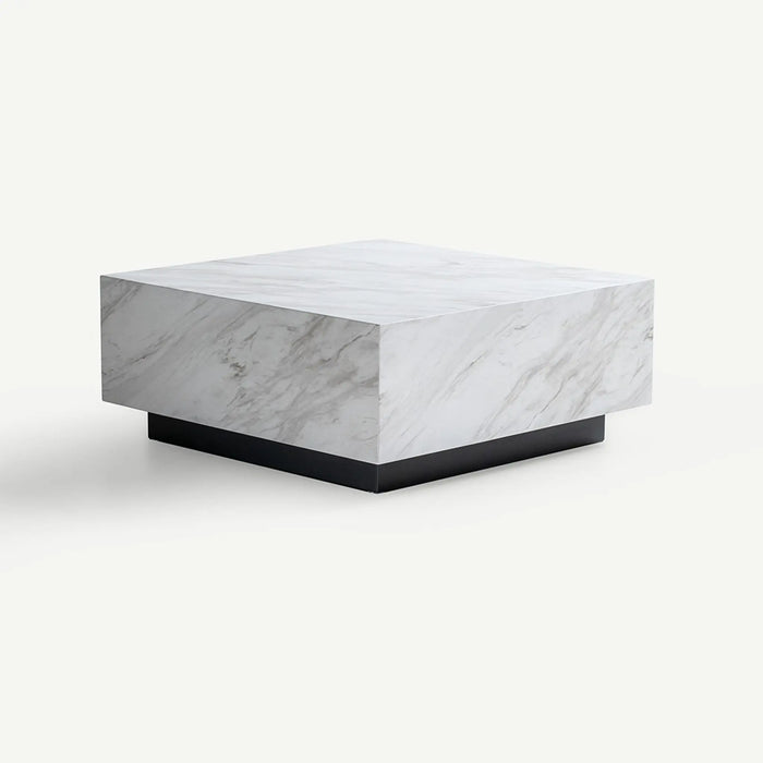 A modern square coffee table with a white marble top featuring gray veining and a contrasting black metal base, shown on a clean off-white background.