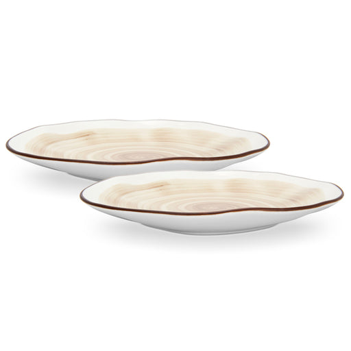 Two white ceramic bowls with brown rims on a white background