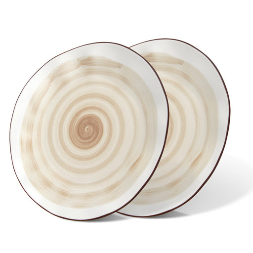 Two round plates with concentric circle pattern on a white background