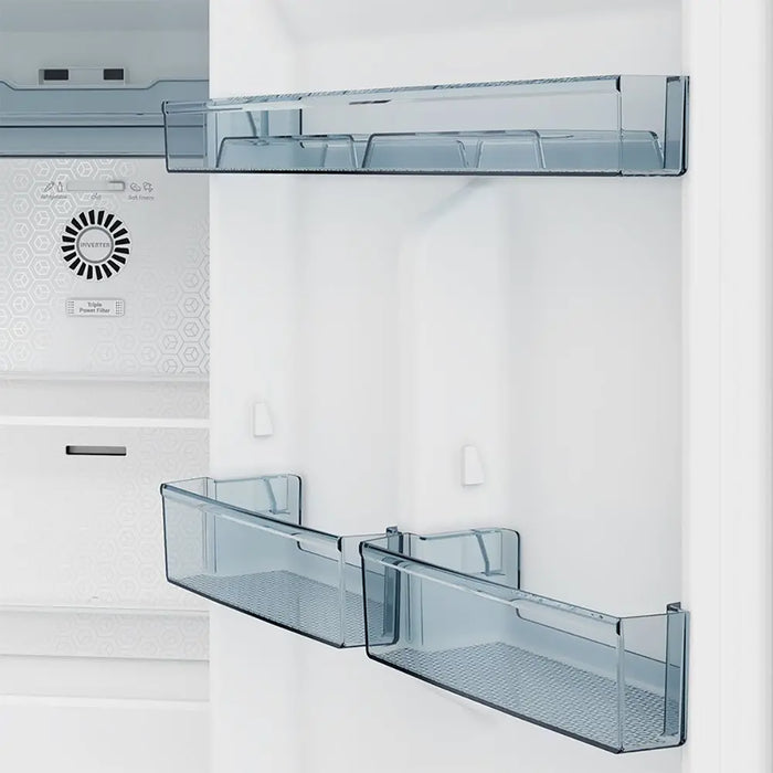 Blue refrigerator drawers inside a white refrigerator