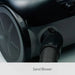 Close-up of a sand blower with visible branding on a dark background