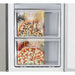 Two pizza boxes, one with a Margherita pizza and the other with a Mushroom & Olive pizza, inside a refrigerator.