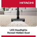 Hitachi vacuum cleaner with LED headlights cleaning a carpet in a living room.