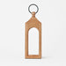 Wooden lantern with a ring handle on a white background