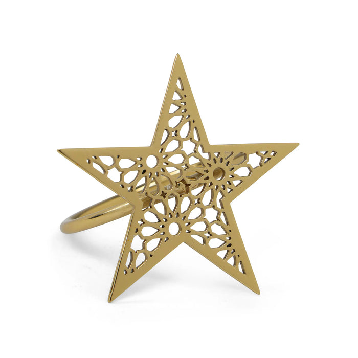 Gold star-shaped ring with intricate cut-out design on a white background
