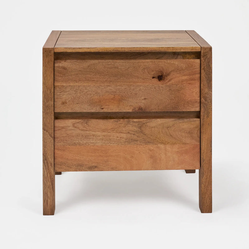 Wooden nightstand with a single drawer on a white background