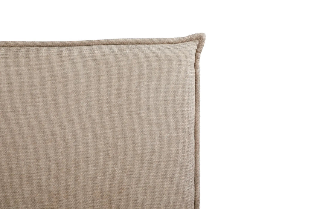 Beige cushion on a white background
