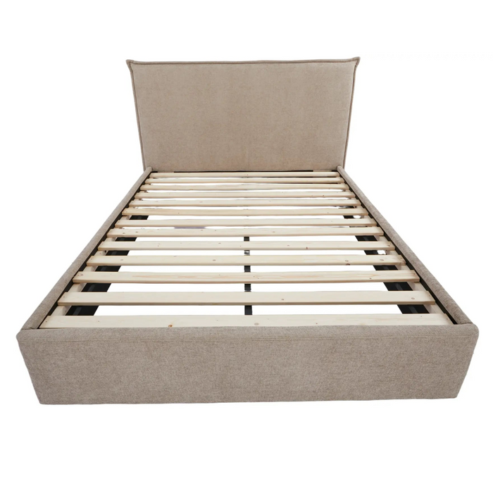Beige upholstered bed frame with wooden slats on a white background