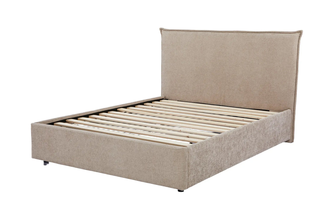 Beige upholstered bed with headboard on a white background