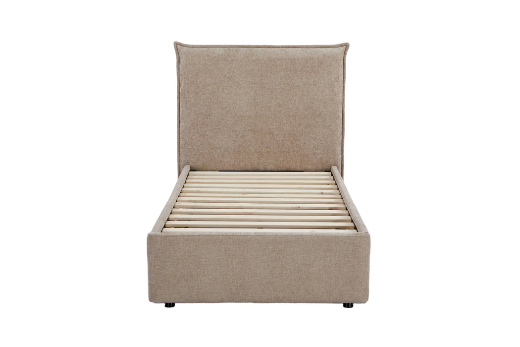Beige upholstered bed frame on a white background