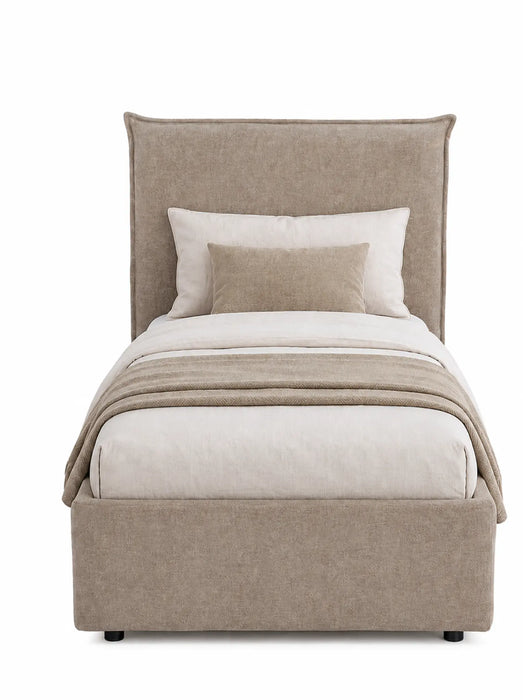 Beige upholstered bed with white bedding and pillows on a white background
