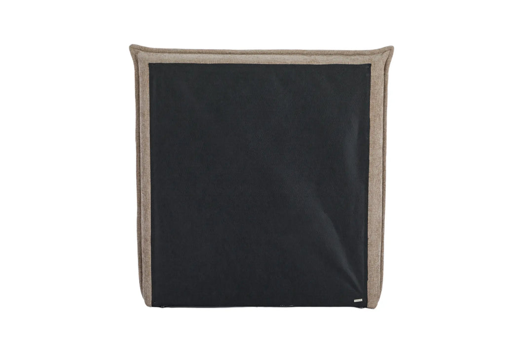 Black fabric with beige border on a white background