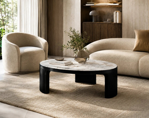 Modern living room with beige sofa, armchair, and marble coffee table.