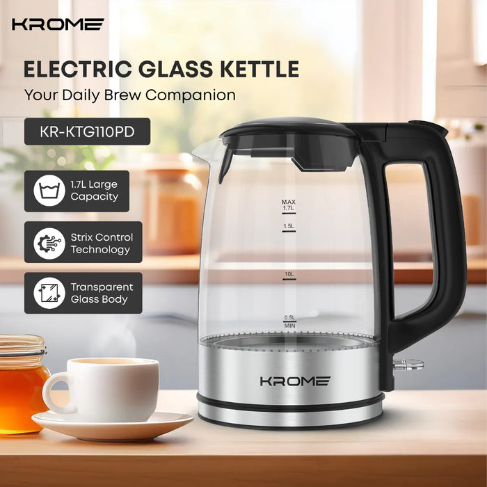 Krome electric glass kettle on a kitchen counter with a cup of tea and honey.