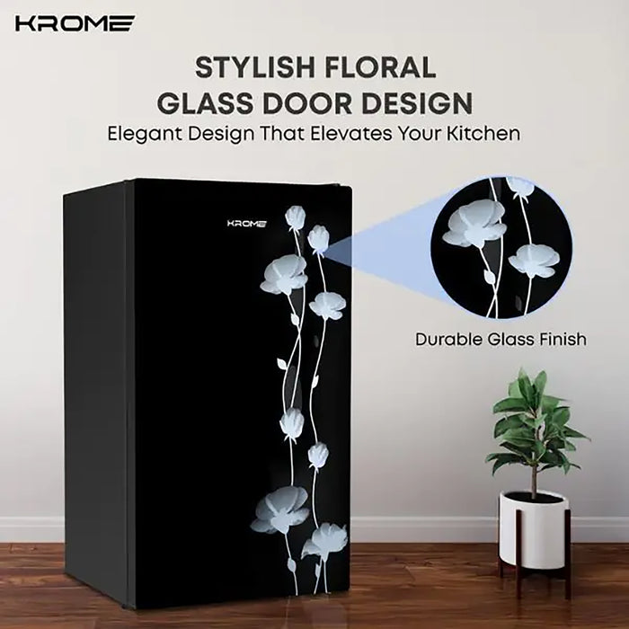 Black refrigerator with floral glass door design by Krome, featuring a plant on a wooden floor.