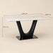 A dining table with a white marble-look rectangular top and a glossy black curved pedestal base, shown on a beige background with dimension labels indicating 180 cm length, 100 cm width, and 75 cm height.