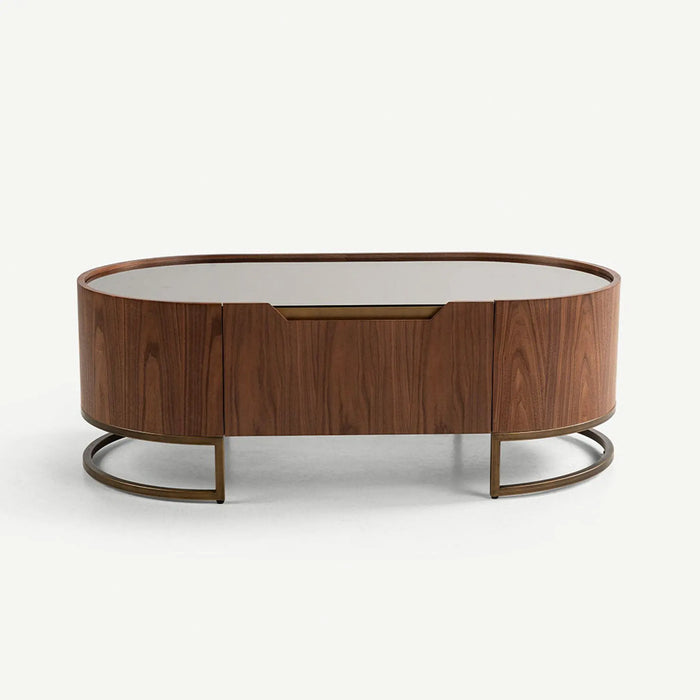 An oval mid-century modern coffee table with a dark walnut wood grain finish, a light gray glass top, and a bronze metal base, shown on a clean off-white background.