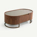 An oval mid-century modern coffee table with a dark walnut wood grain finish, a mirrored top, and a bronze metal base, shown on a light gray background.