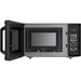 Black microwave oven with open door on a white background