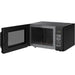 Black microwave oven with open door on a white background