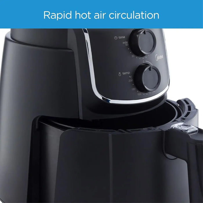 Black air fryer with dual cyclone air technology on a white background