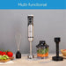 Multifunctional kitchen blender with attachments on a wooden surface