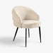 A modern upholstered accent chair with a rounded, cloud-like backrest and seat in a textured beige fabric, supported by slim black metal legs, shown on a light gray background.