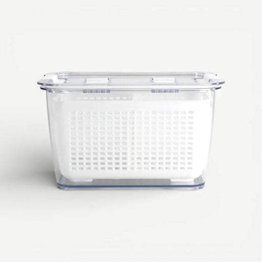 Clear plastic storage basket on a white background