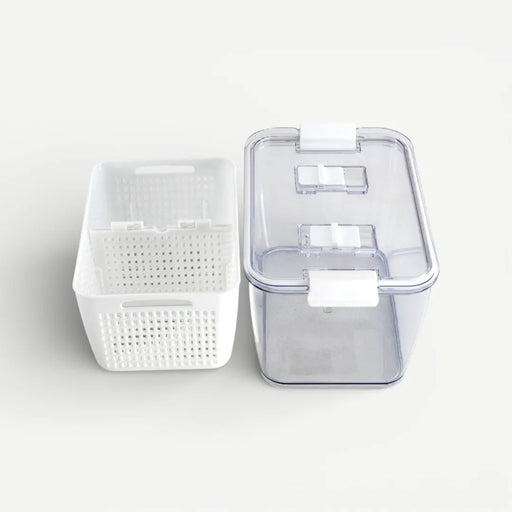 White storage basket and clear plastic container on a light gray background