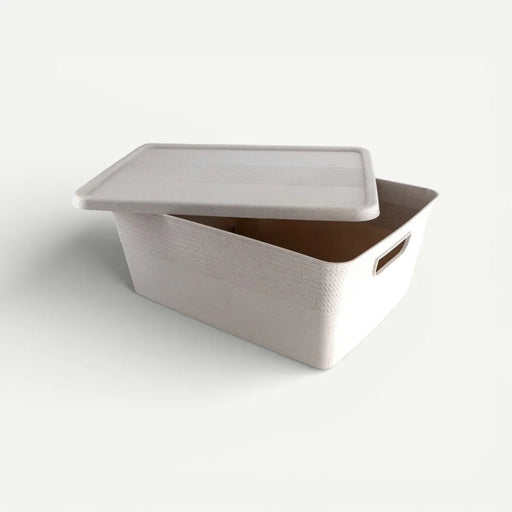 White storage box with a lid on a white background