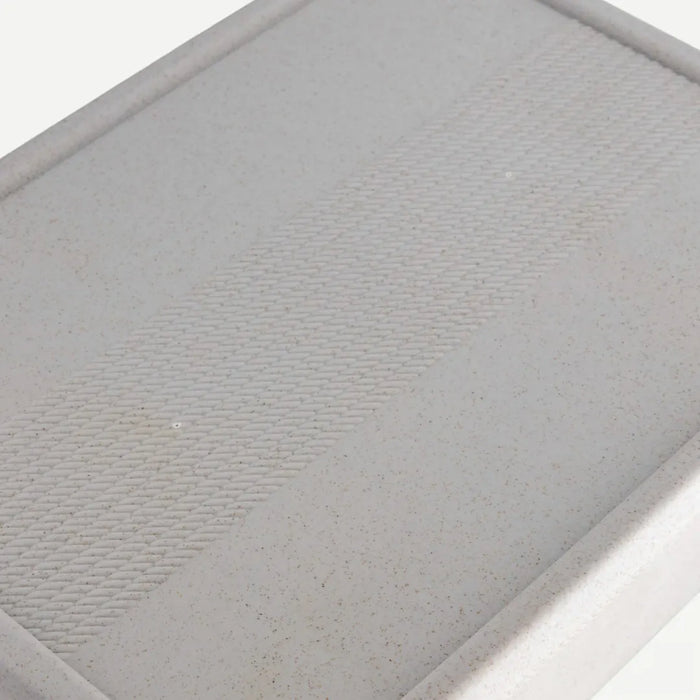 Gray textured mat on a white background