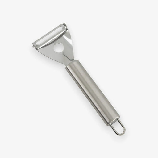 Metal vegetable peeler on a white background