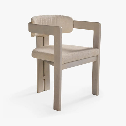 Beige chair with cushioned seat and backrest on a white background
