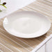 Essentials 4-Piece Porcelain Dinner Plate - White Pan Home