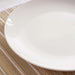 Essentials 4-Piece Porcelain Dinner Plate - White Pan Home