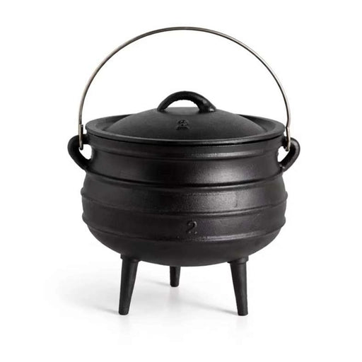Black cast iron pot with lid on a white background